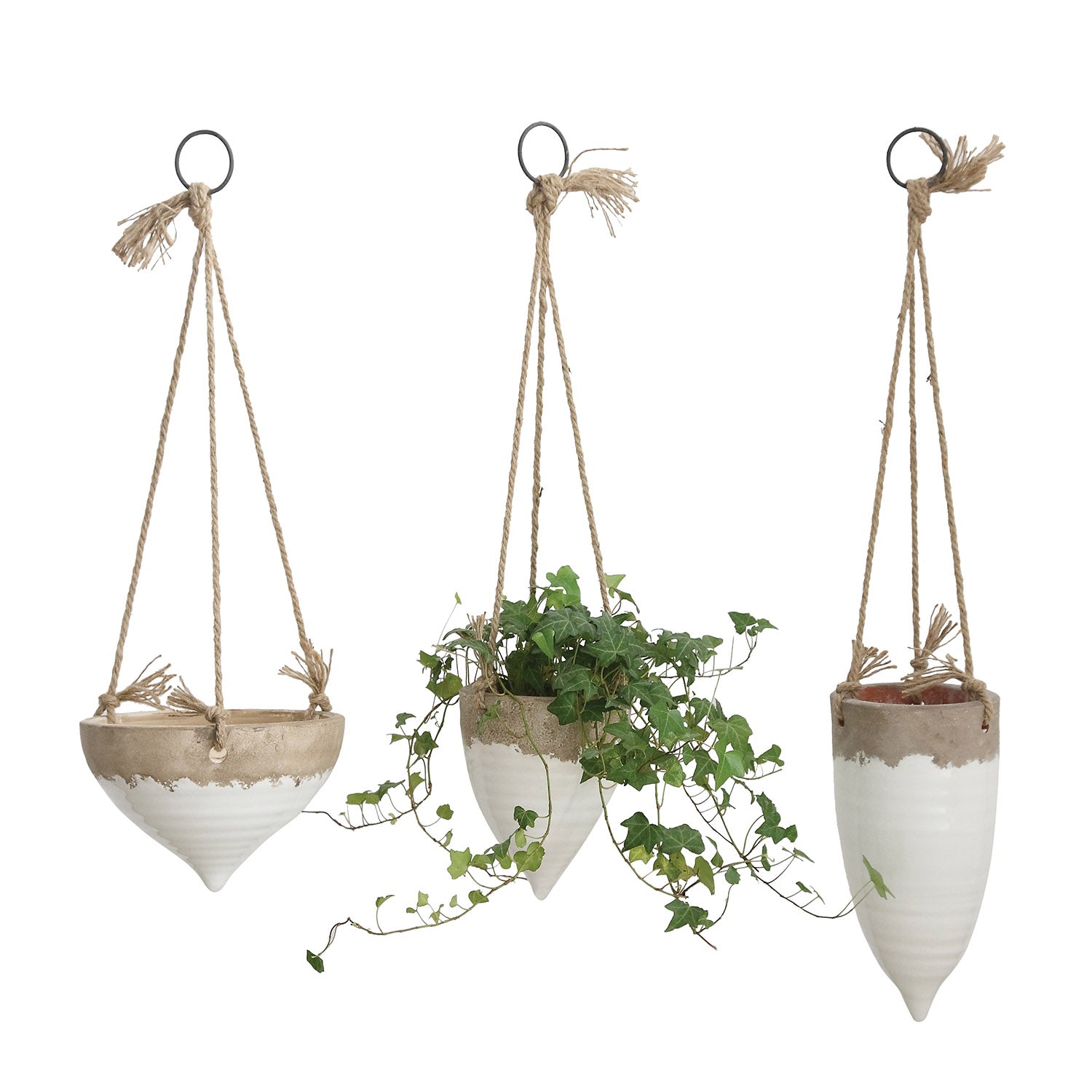 A white stoneware hanging planter with jute rope